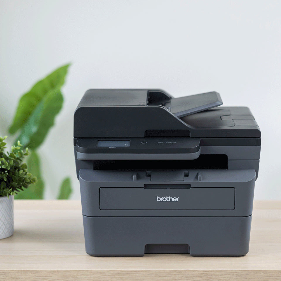 Kompakter A4 Schwarzweiß-Laserdrucker All-in-One mit Duplexdruck und drahtloser Netzwerkverbindung zum schnellen und sicheren Drucken von Dokumenten mit bis zu 34 Seiten pro Minute.